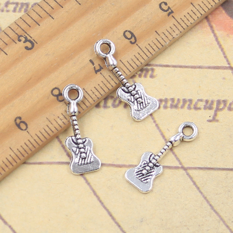 30pcs Charms Lovely Instrument - مراجعة Musical Instrument Like Guitar وسعره