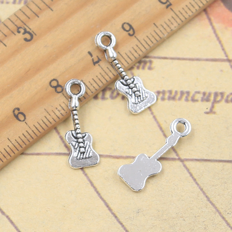 30pcs Charms Lovely Instrument - مراجعة Musical Instrument Like Guitar وسعره