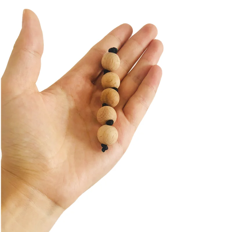 Montessori Wood Bell Rattle In - مراجعة Musical Instrument Rattle وسعره