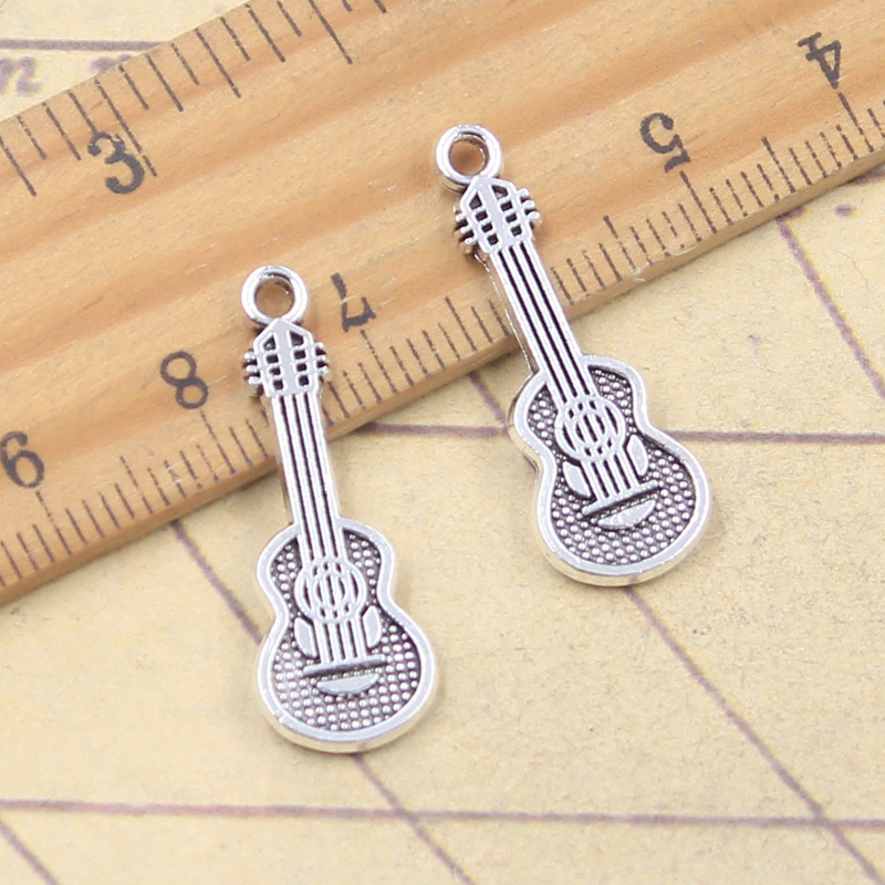 20pcs Charms Musical Instrumen - مراجعة Musical Instrument Like Guitar وسعره